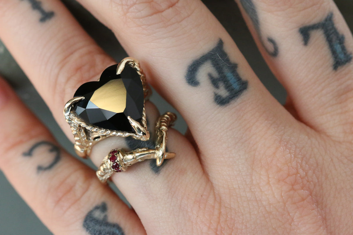 Cross Claws with a Ruby Ring